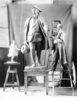 Titre original&nbsp;:  R. Tait (Robert Tait) McKenzie at work in his studio on his sculpture of young Benjamin Franklin, 1911