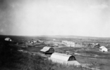 Original title:  "Hutterite colony, Stand Off, Alberta.", 1920, (CU1107641) by Unknown. Courtesy of Glenbow Library and Archives Collection, Libraries and Cultural Resources Digital Collections, University of Calgary.